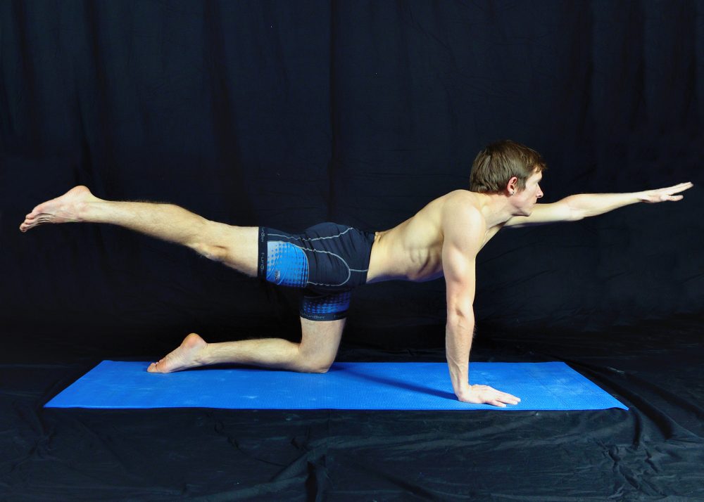 Yoga pose demonstration - table balancing in Sudbury Suffolk & Norwich